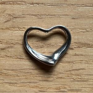 Tiffany & Co. vintage 90s Elsa Peretti open heart pendant. Sterling silver.